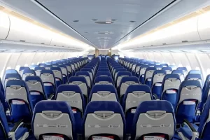 Por que devo colocar o assento na posição vertical em pousos e decolagens? 1 Assento no avião